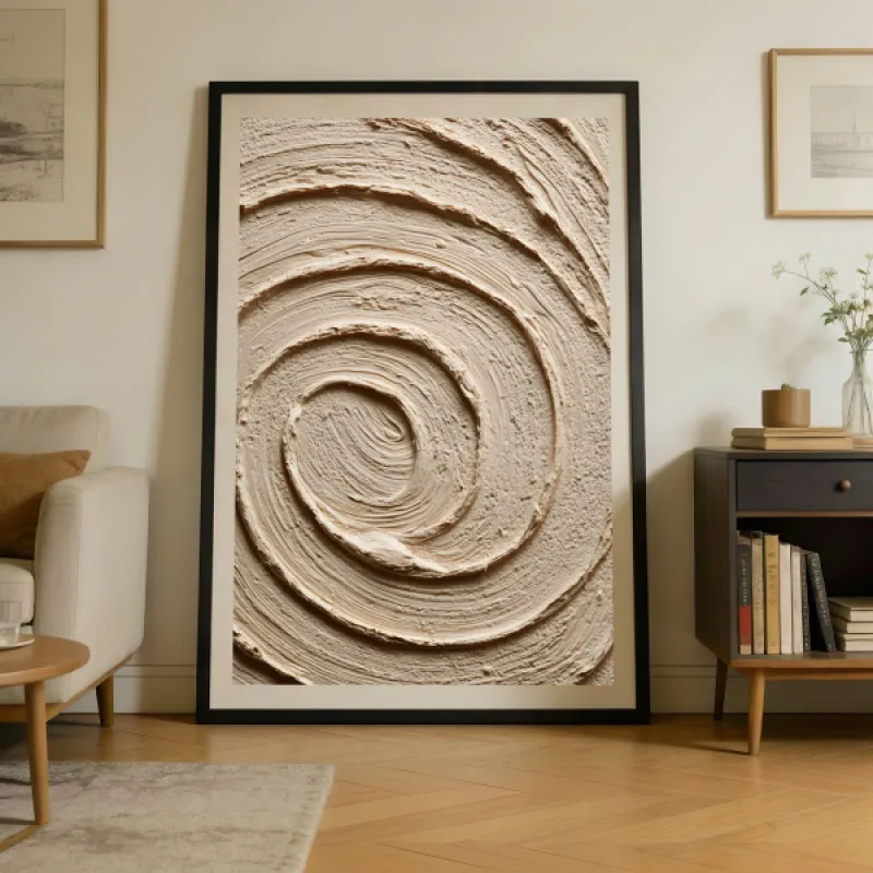 Close-up of an abstract spiral in sculpted beige textured material with warm brown tonal grooves.