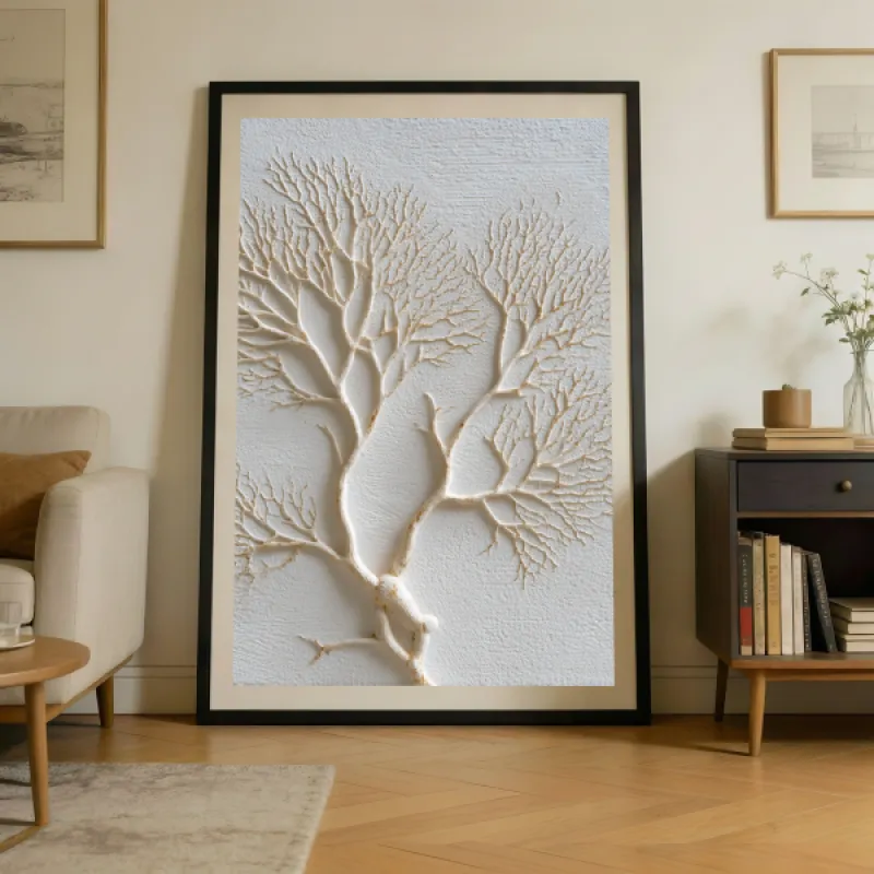 Relief-style image of a bare tree with fine branching details in cream white on a white textured background.